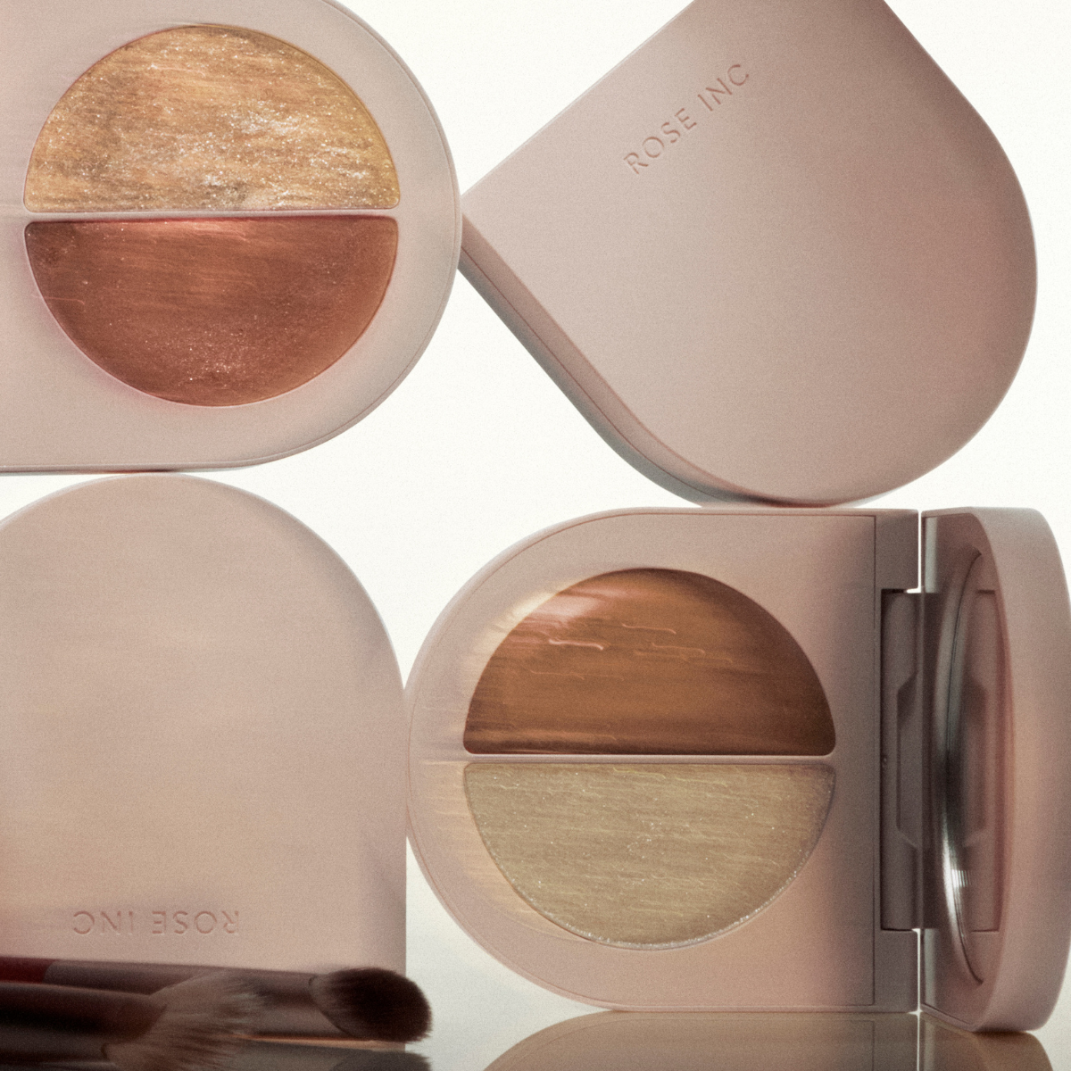 Image of a model wearing the Rose Inc Satin and Shimmer Eyeshadow Duet Palette in Copper along with the Ultra-Black Mascara.